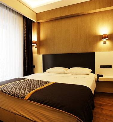 Riva Hotel deluxe bedroom